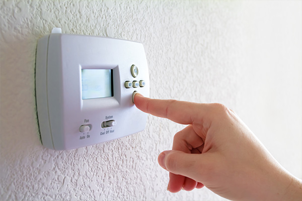 Finger pressing thermostat