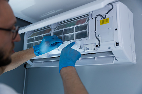 Rep Fixing Ductless Unit